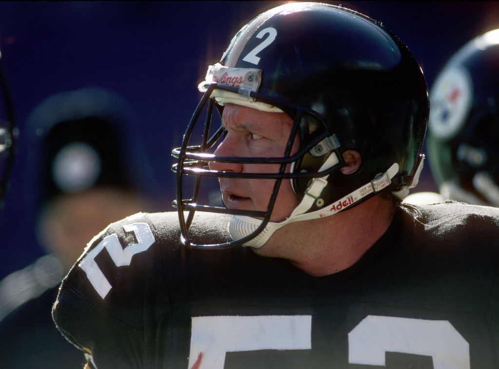 Center Mike Webster of the Pittsburgh Steelers looks on from the sideline during an NFL game