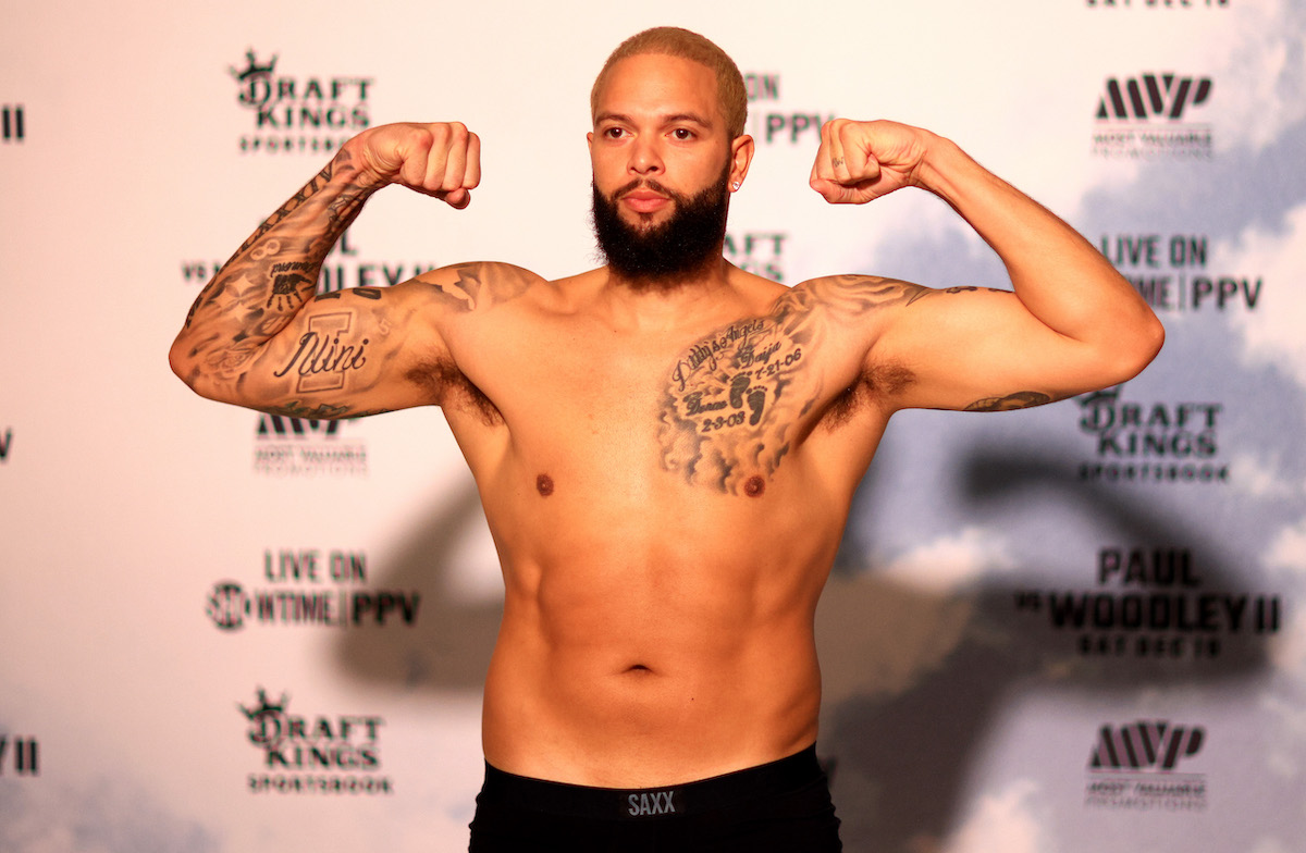 Deron Williams poses before his exhibition fight with Frank Gore
