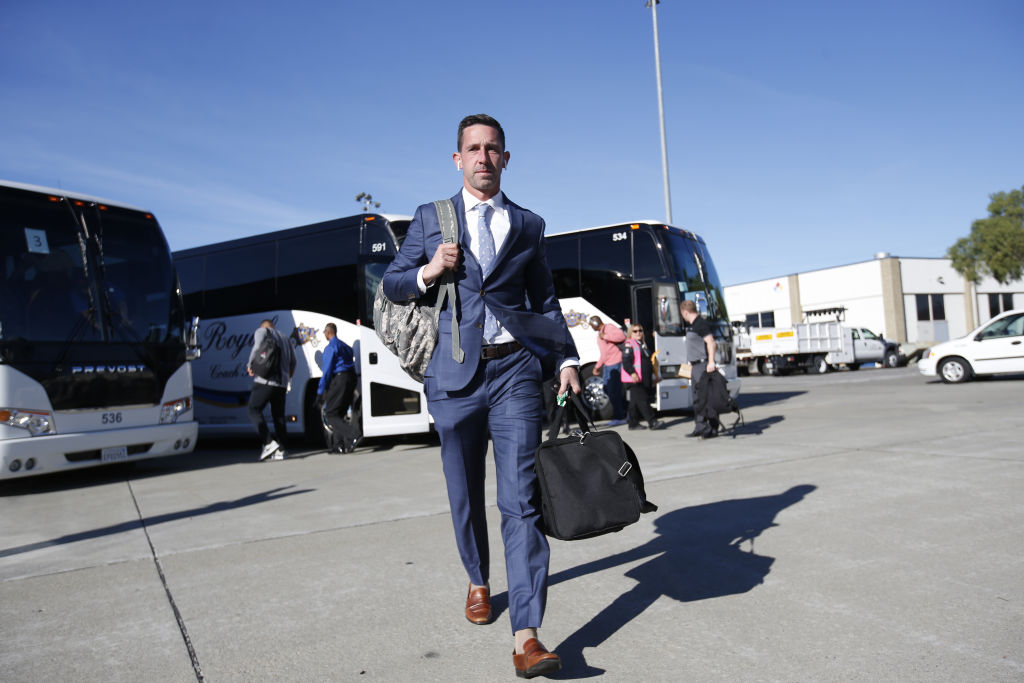 Head Coach Kyle Shanahan of the San Francisco 49ers gets ready to board a plane