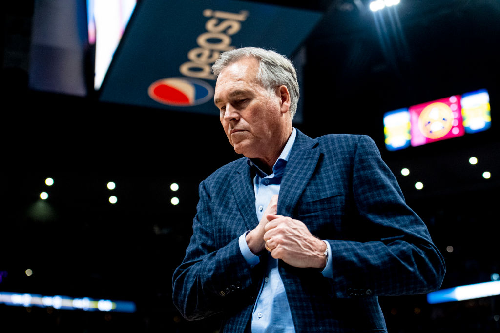 Head coach Mike D'Antoni of the Houston Rockets walks off the court after playing the Denver Nuggets