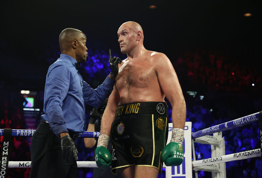Referee Kenny Bayless deducts a point from Tyson Fury during a Heavyweight bout