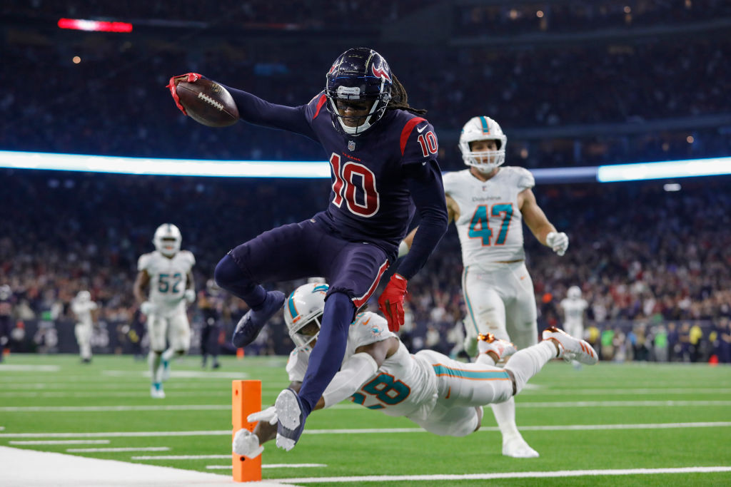 DeAndre Hopkins scores a touchdown for the Houston Texans against the Miami Dolphins. 