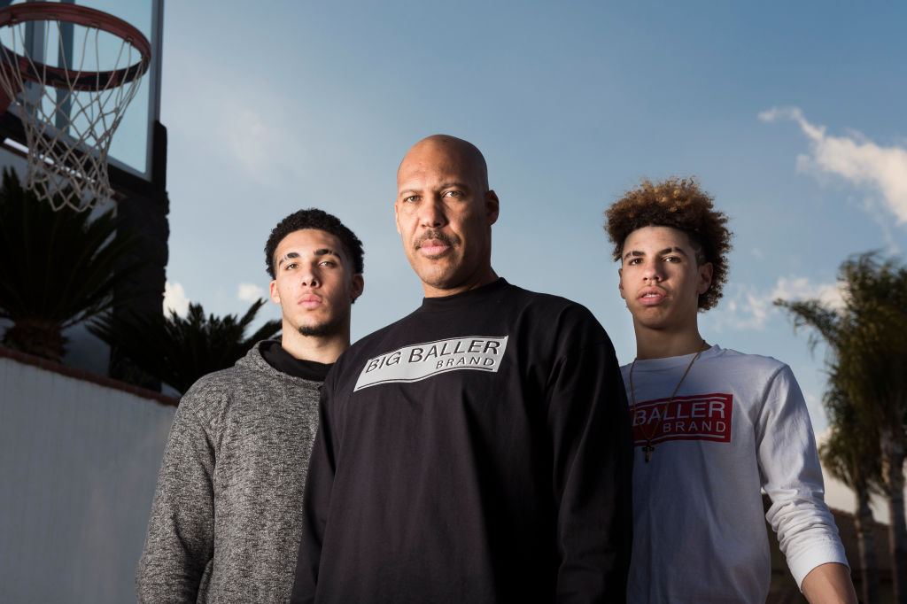 LaVar Ball (C) with his sons LiAngelo (L) and LaMelo in 2017