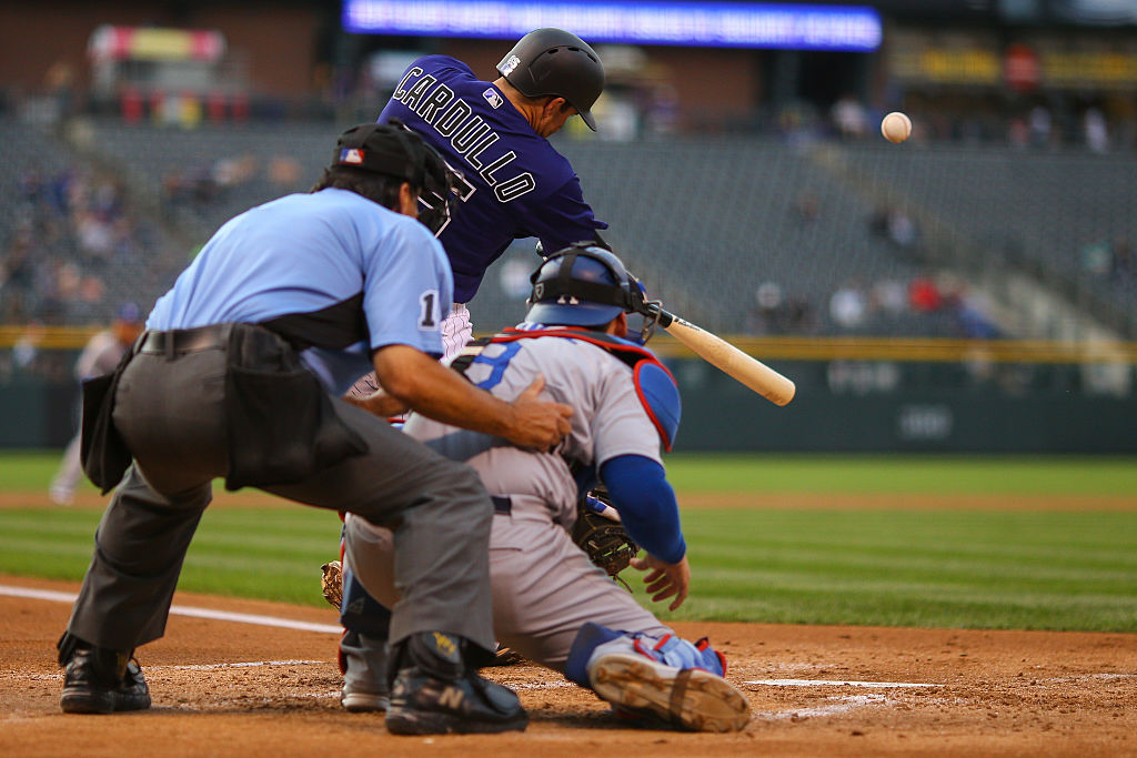 An MLB catcher waits for a pitch to come in