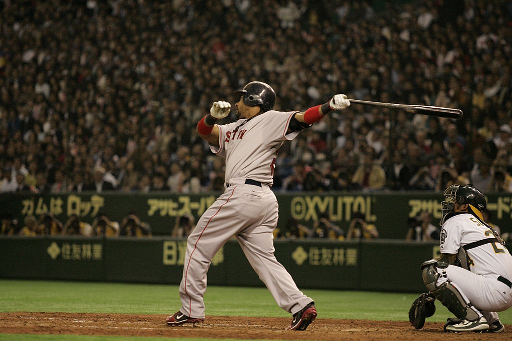 Boston Red Sox left fielder Manny Ramirez had four RBIs in Boston's 6-5 victory over Oakland on March 25, 2008. The game took place in Japan and marked the earliest opening day in MLB history.