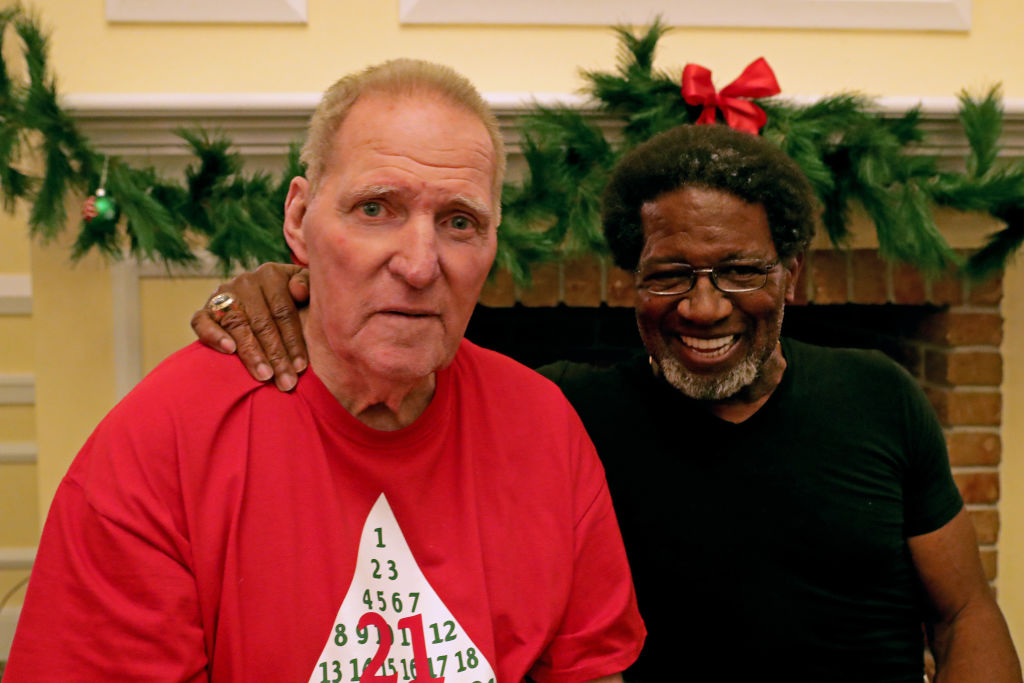 Former Miami Dolphins running backs Jim Kiick (L) and Mercury Morris smile at Independence Hall assisted living facility in 2018