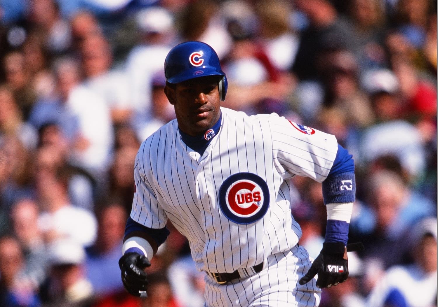 Sammy Sosa of the Chicago Cubs runs against the Arizona Diamondbacks at Wrigley Field on April 30, 2000.