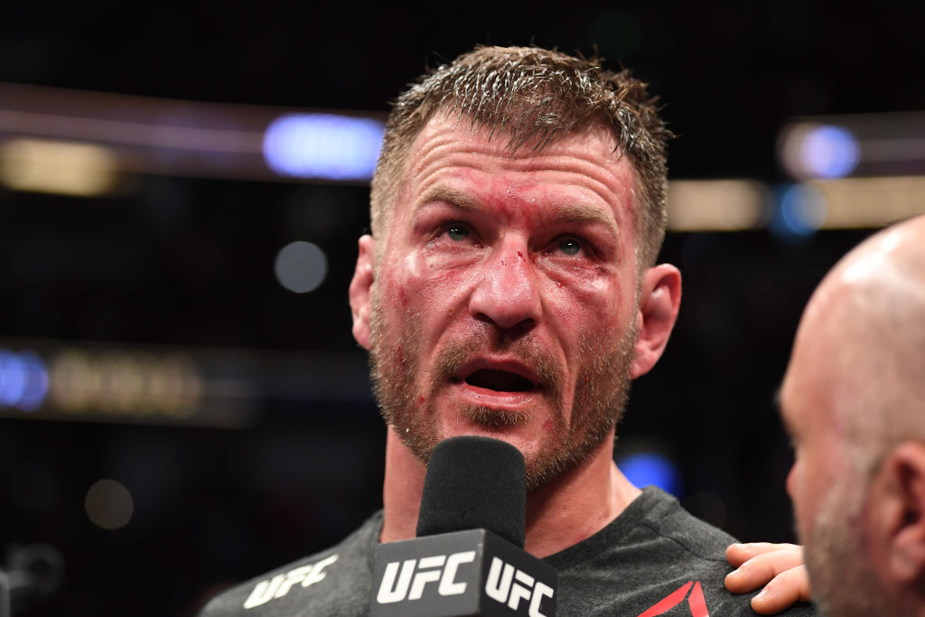 Stipe Miocic is interviewed after his TKO victory over Daniel Cormier in their heavyweight championship bout during the UFC 241 in 2019