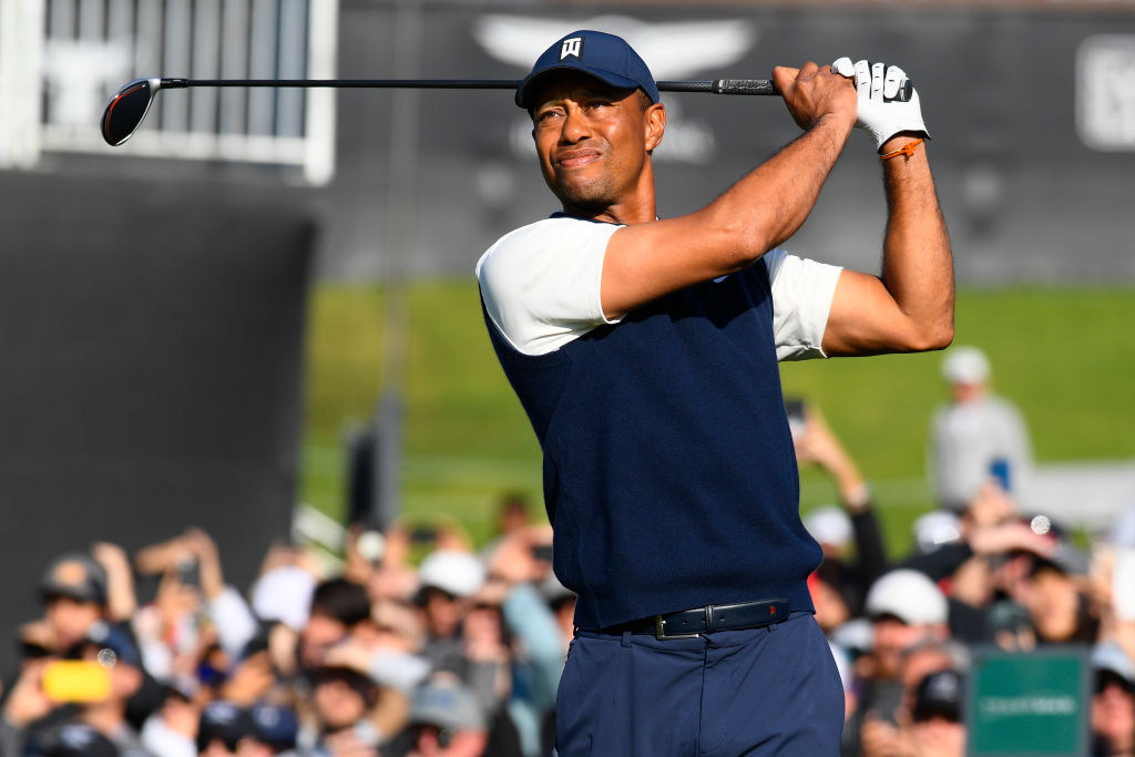Tiger Woods drives the ball on the 9th hole tee during the Genesis Genesis Invitational golf tournament in 2020