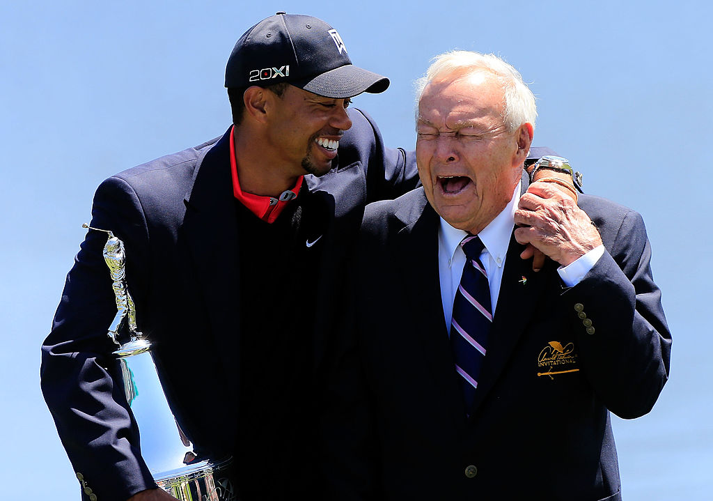 Tiger Woods and Arnold Palmer laugh during the ceremony following the 2013 Arnold Palmer Invitational