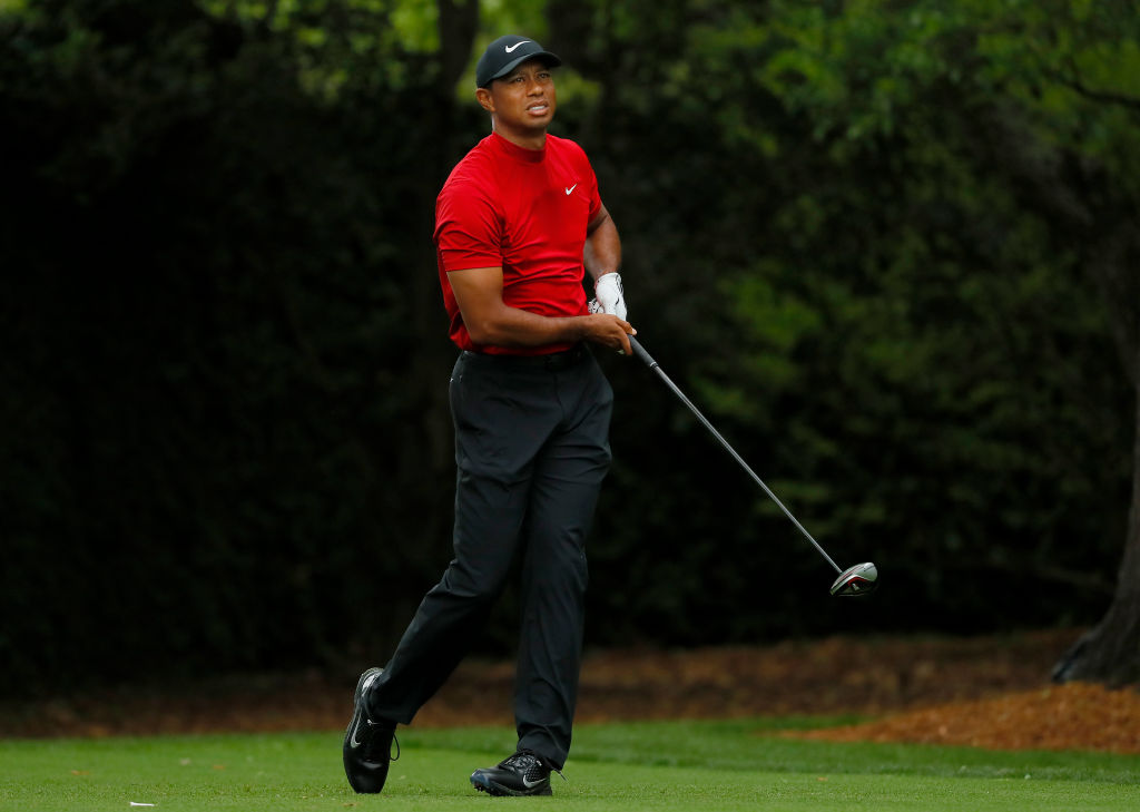 Tiger Woods plays his shot in the final round of the 2019 Masters at Augusta National Golf Club
