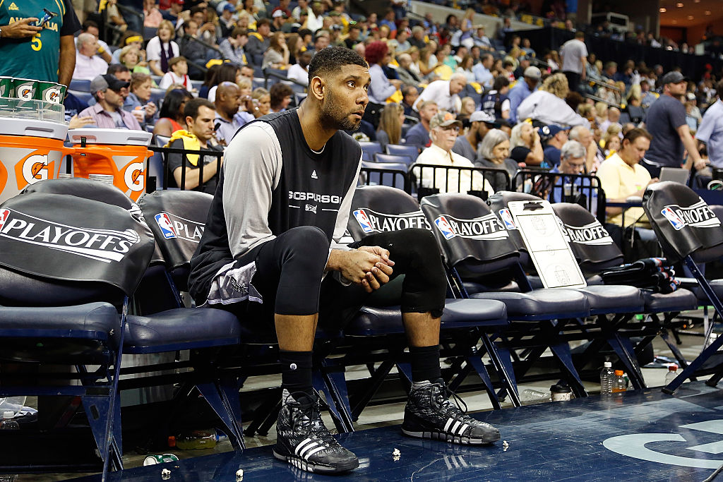 Tim Duncan of the San Antonio Spurs sits on the bench in 2016