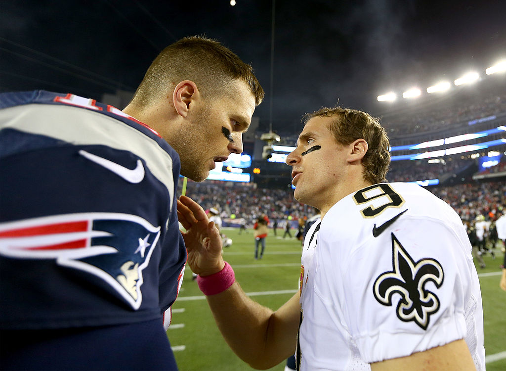Tom Brady of the Patriots and Drew Brees of the Saints talk after a game