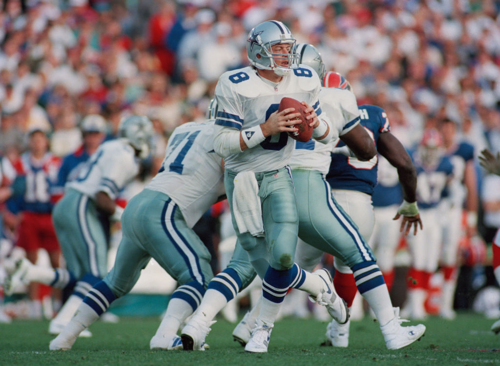 Former NFL quarterback Troy Aikman drops back for the Dallas Cowboys. Aikman won three Super Bowls after a bad rookie season.