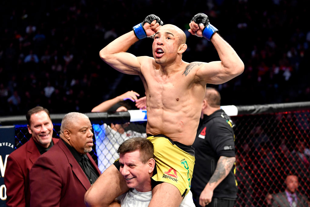 Jose Aldo of Brazil celebrates in the octagon