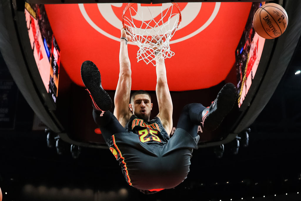 Alex Len of the Atlanta Hawks dunks the ball