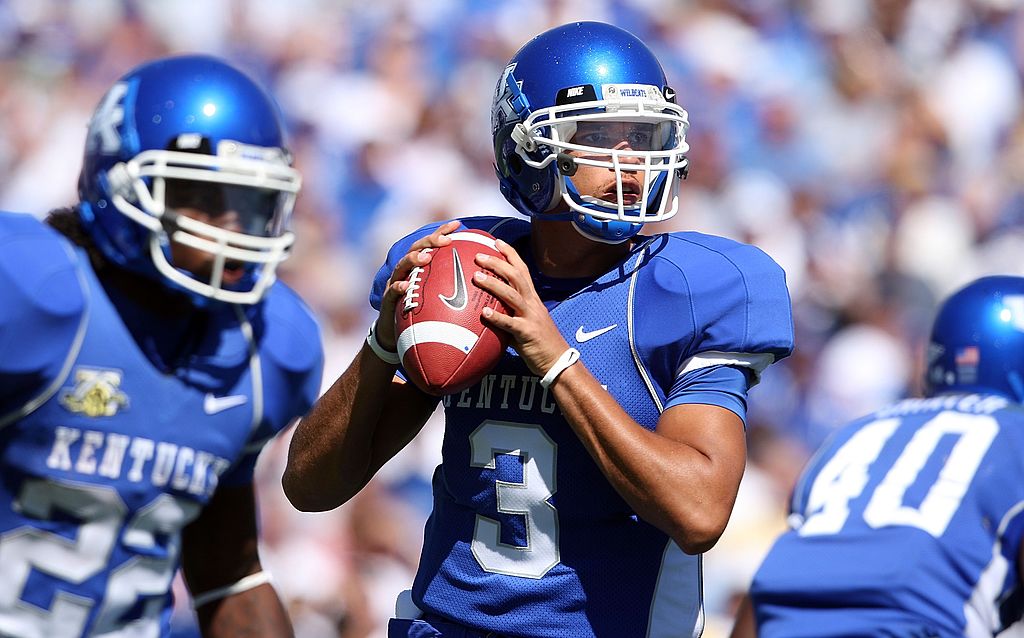 Kentucky Wildcats quarterback Andre' Woodson once threw 40 touchdowns in a season. Woodson now works at Amazon.