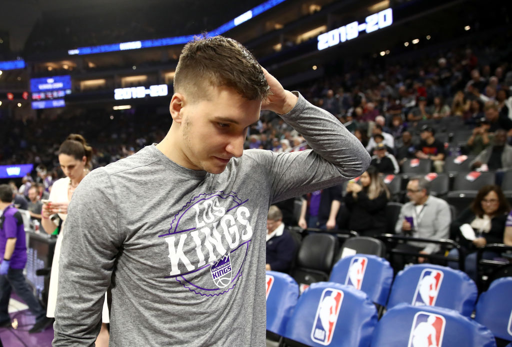 Bogdan Bogdanovic of the Sacramento Kings leaves the court after a game