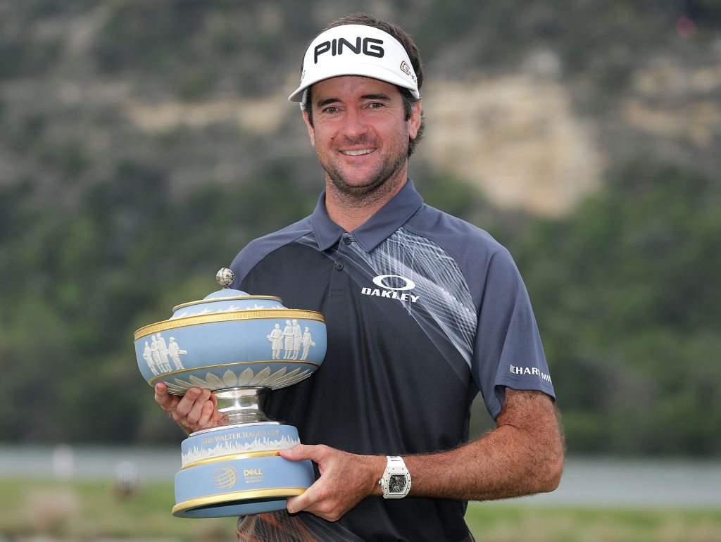 Bubba Watson holding the trophy from the World Golf Championship