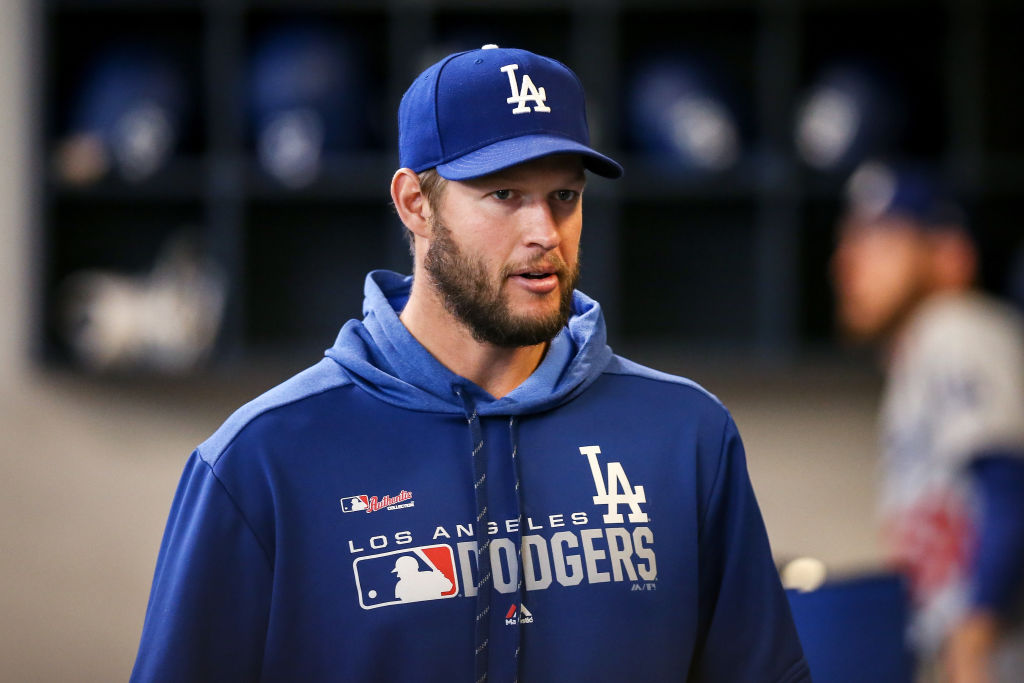 Clayton Kershaw of the Los Angeles Dodgers walks through the dugout in 2019