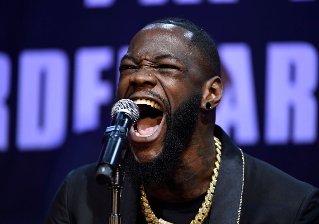 Deontay Wilder screams during a 2020 news conference