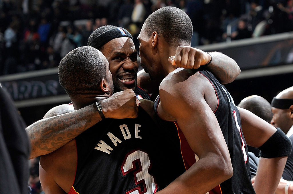 LeBron James celebrates with Dwyane Wade and Chris Bosh of the Miami Heat in 2010