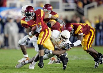 LenDale White dominated as a power running back at USC before getting drafted by the Tennessee Titans in the 2006 NFL draft.
