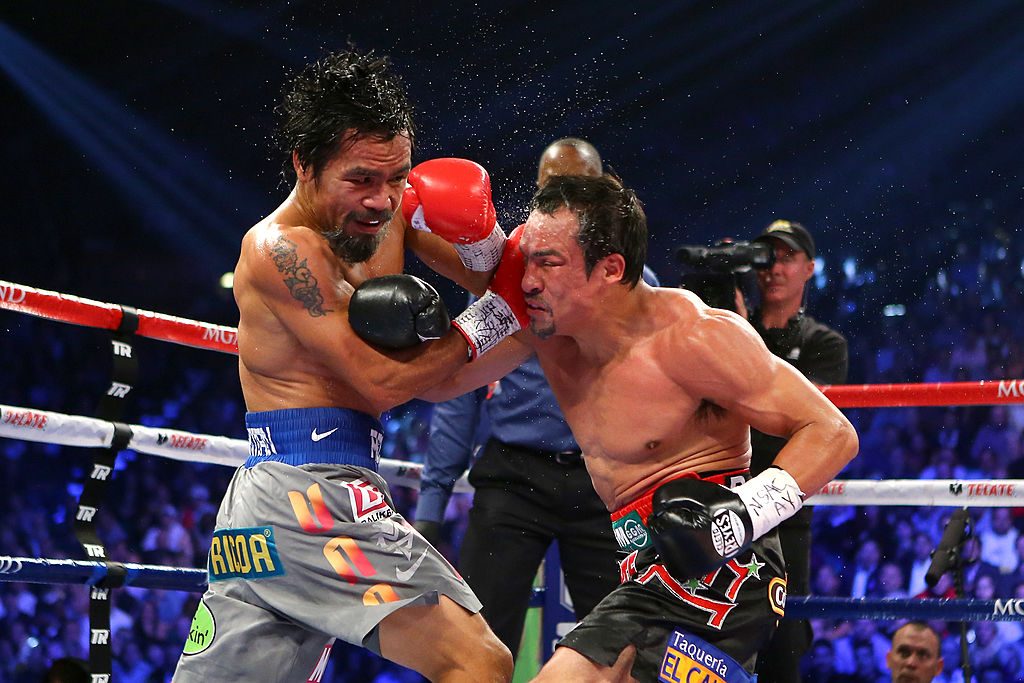 Manny Pacquiao and Juan Manuel Marquez exchange blows in 2012