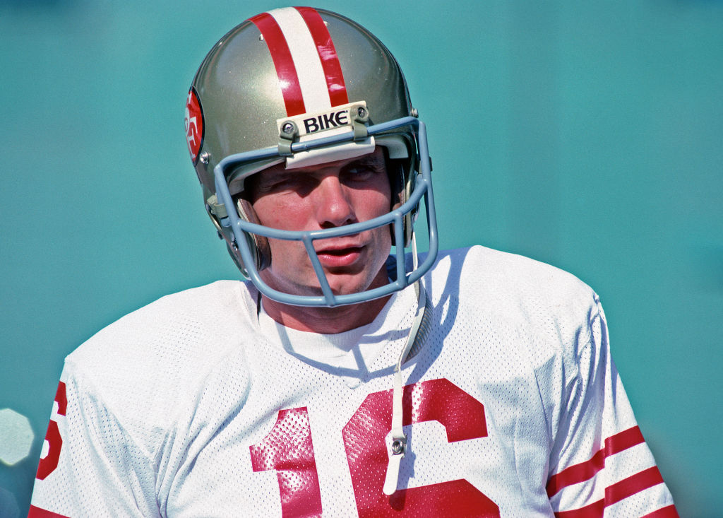 Quarterback Joe Montana of the San Francisco 49ers looks on from the sideline in 1981