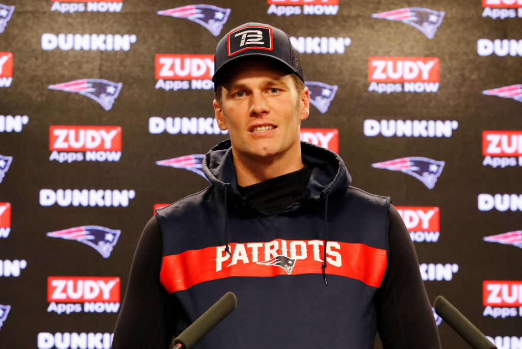 Patriots quarterback Tom Brady takes a question in 2019