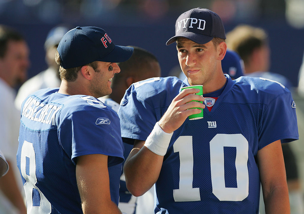 Quarterbacks Eli Manning and Tim Hasselbeck of the New York Giants on the sidelines in 2005