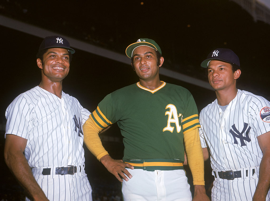 The Alou brothers (L-R) Felipe Alou of the New York Yankees, Jesus Alou of the Oakland Athletics, and Matty Alou of the Yankees in 1973