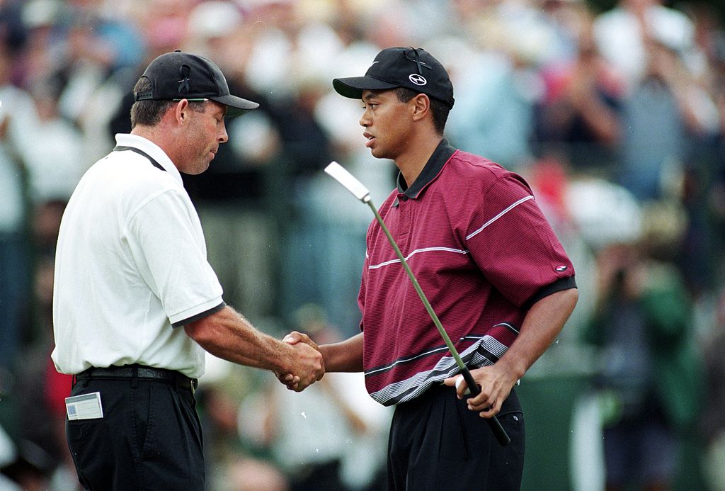Tiger Woods shakes hands with Steve Williams during The Tour Championship in 1999