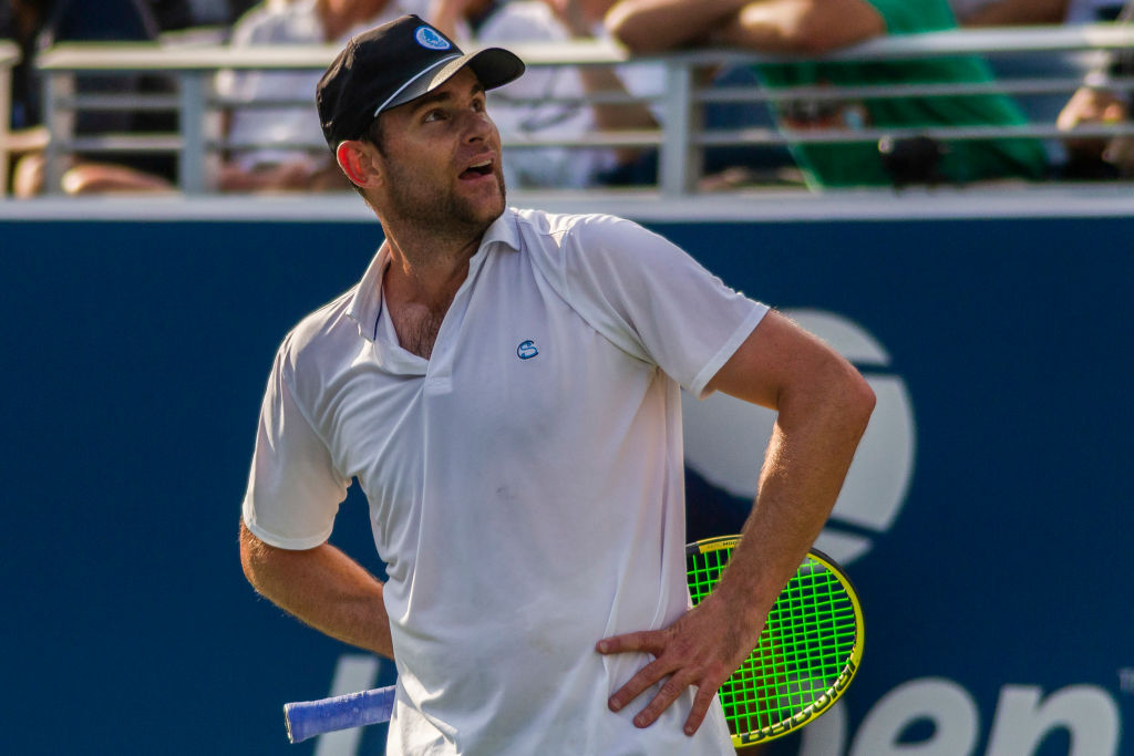 Andy Roddick gestures during his 2019 exhibition game