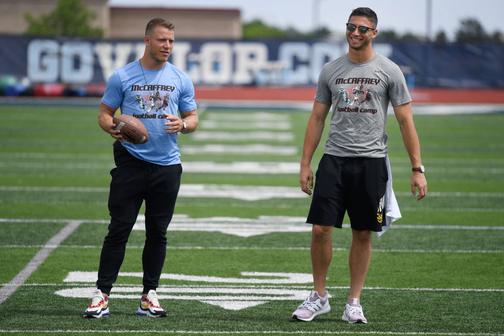 Christian McCaffrey and his brother at a football camp