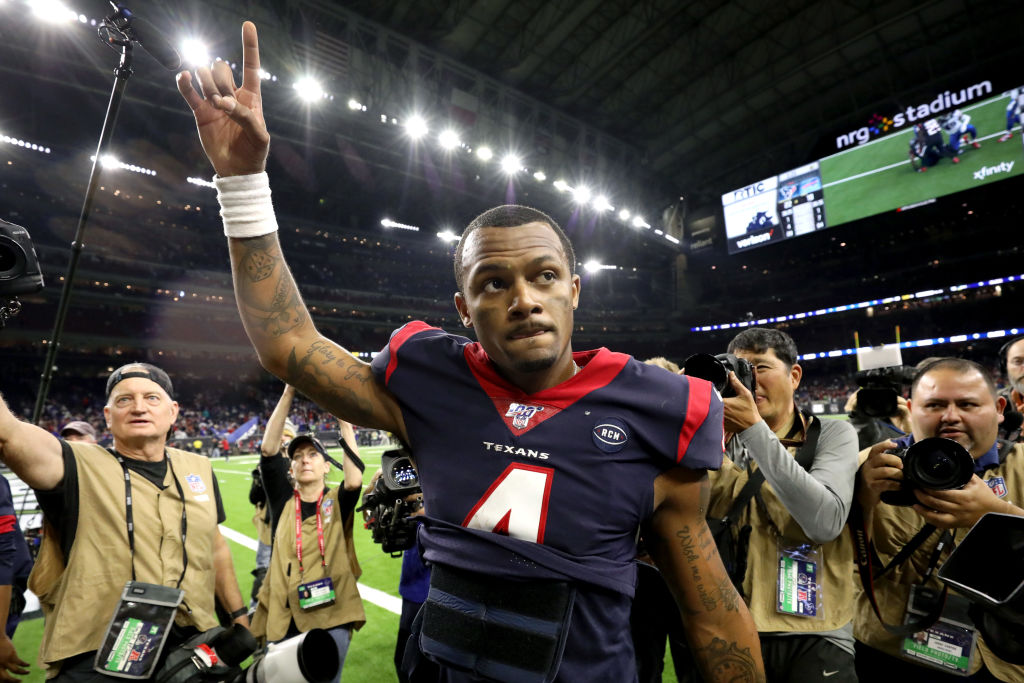 Deshaun Watson walking off the field after winning a game