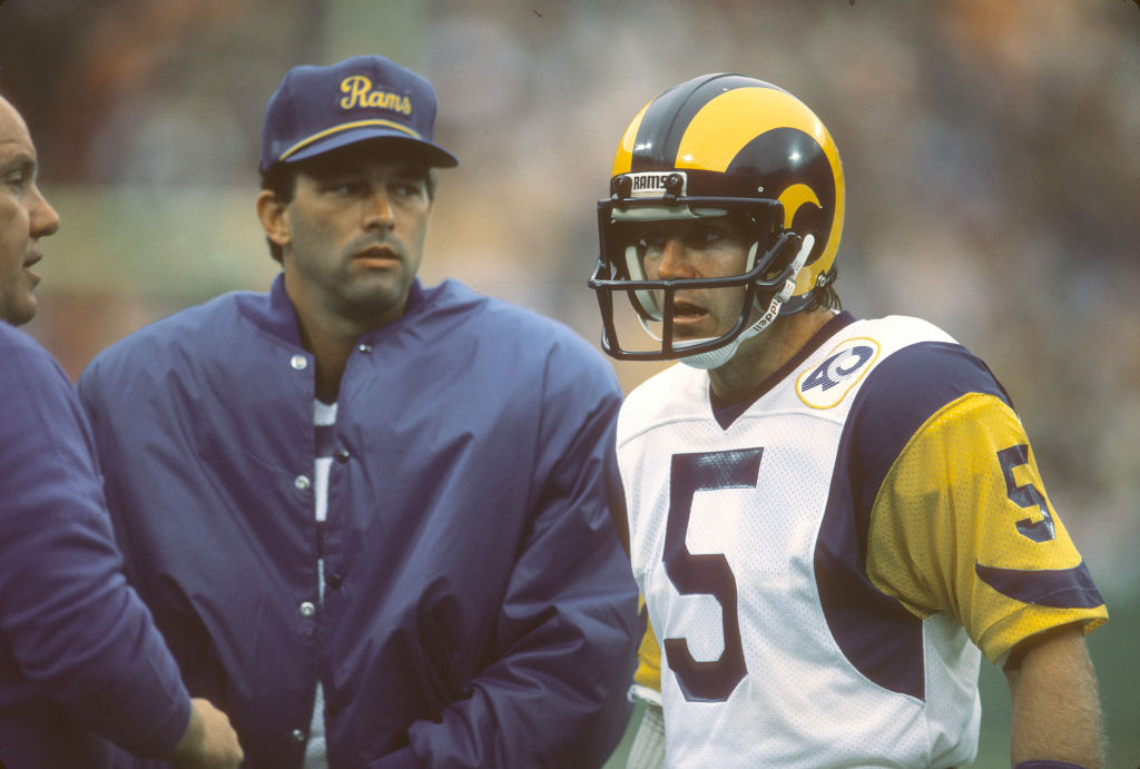 Dieter Brock of the Los Angeles Rams talks with head coach John Robinson