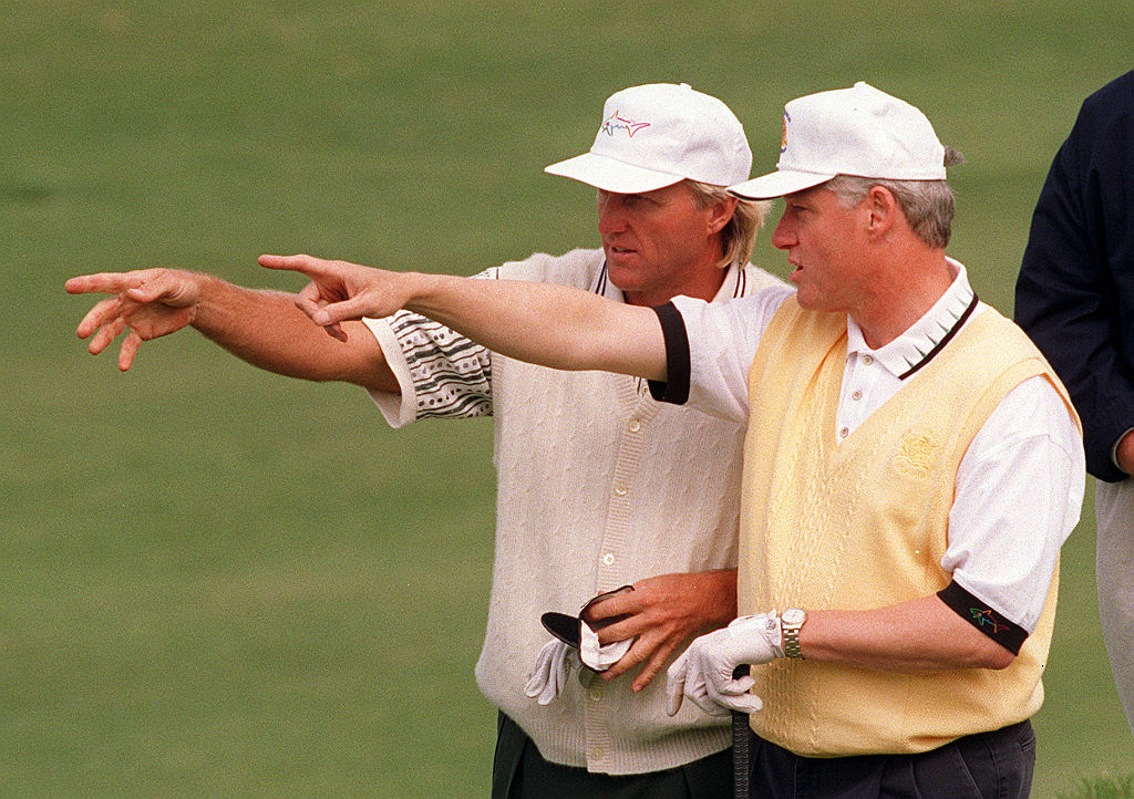 While Greg Norman was the pro on the golf course, he still learned a lesson during a round with Bill Clinton.