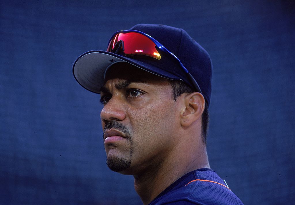 Juan Gonzalez looks on during a baseball game