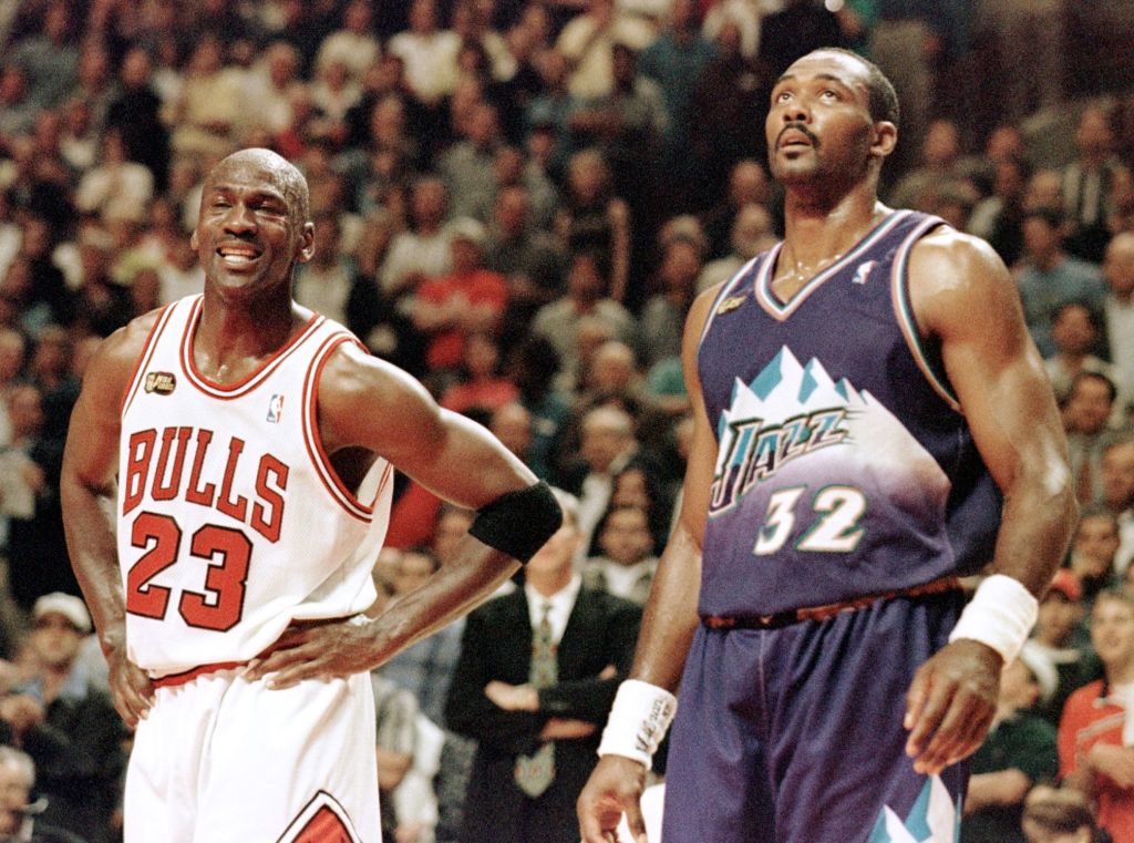 Karl Malone respects Michael Jordan, but he's not ready to kiss His Airness' ring.