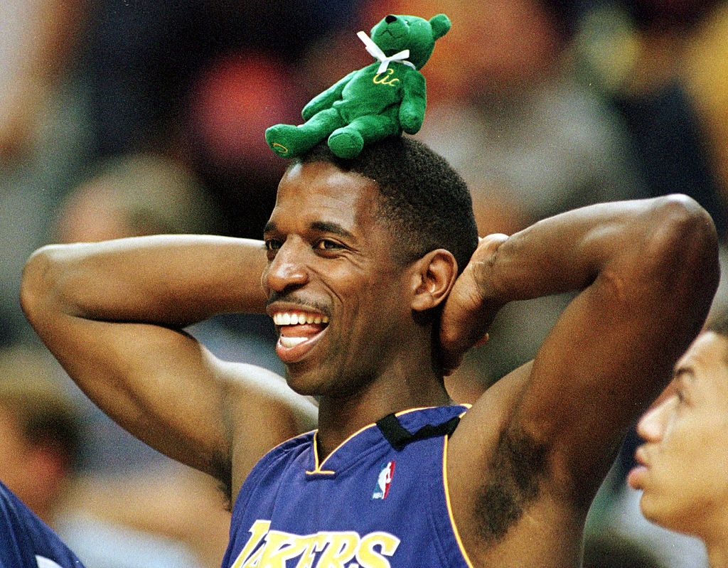 Lakers guard A.C. Green wears a Beanie Baby bear on his head in 2000