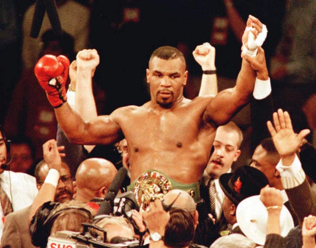 Mike Tyson celebrates a knockout win