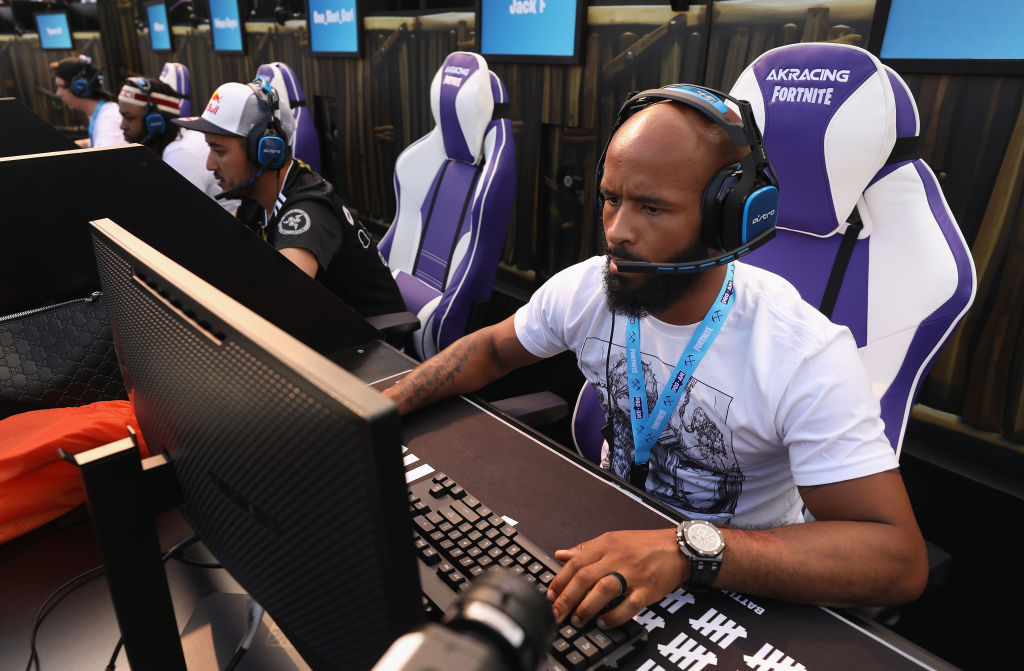 UFC Fighter Demetrious Johnson competes in the Epic Games Fortnite E3 Tournament