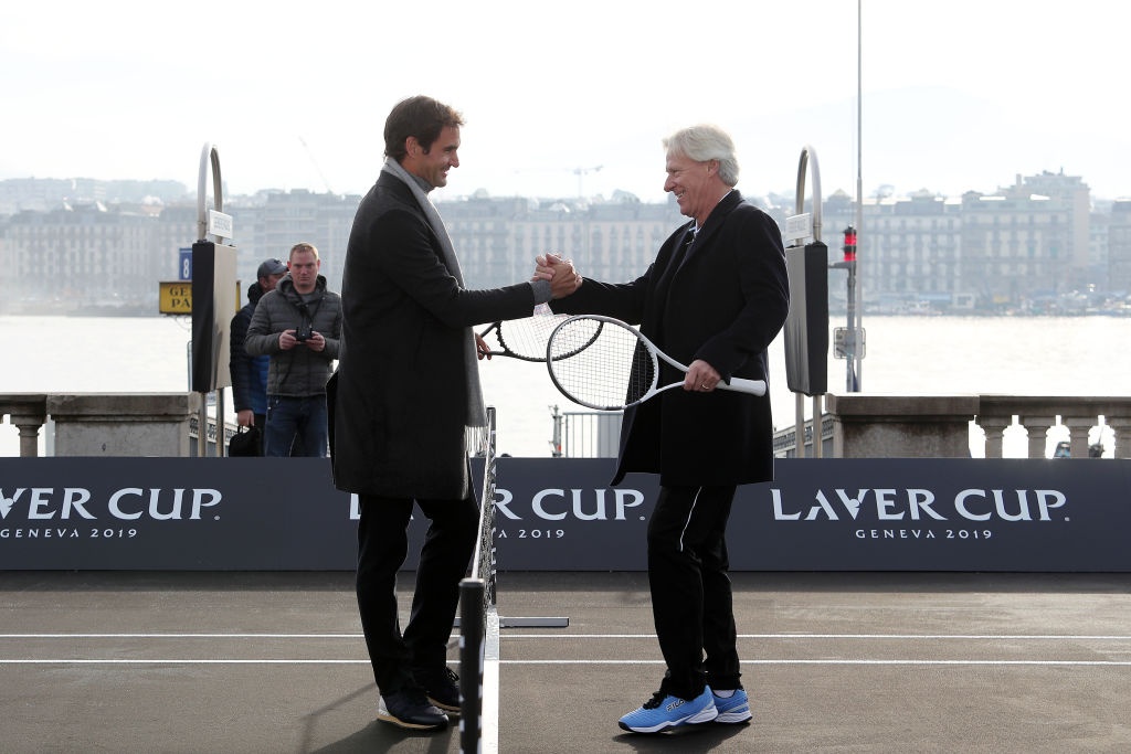 Bjorn Borg shakes hands with Roger Federer in 2019