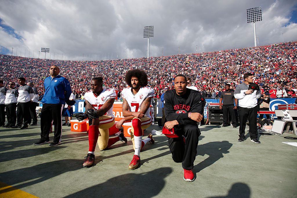 How much money has Colin Kaepernick given to charity?