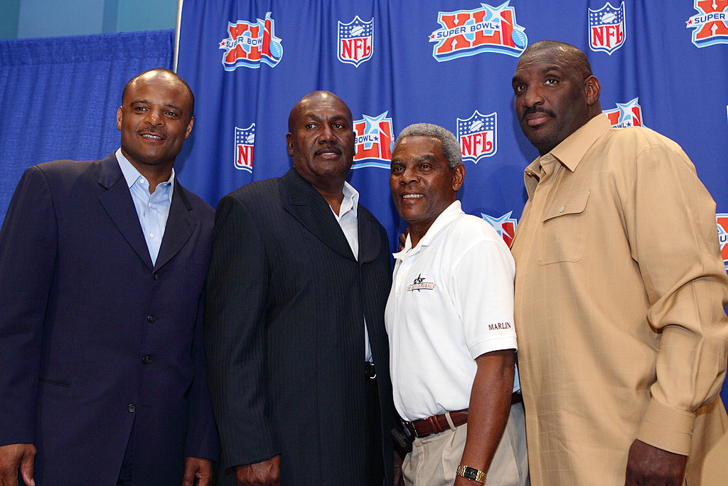Former NFL quarterbacks (L-R) Warren Moon, James Harris, Marlin Briscoe and Doug Williams