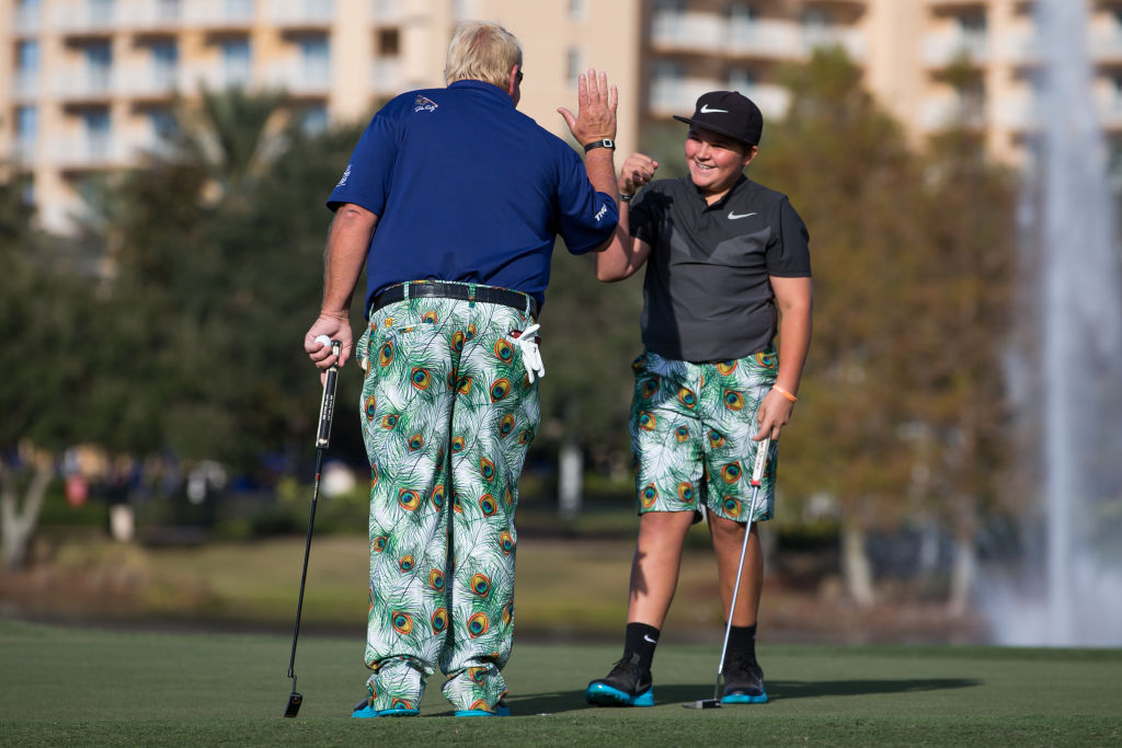 John and Little John Daly celebrate a putt