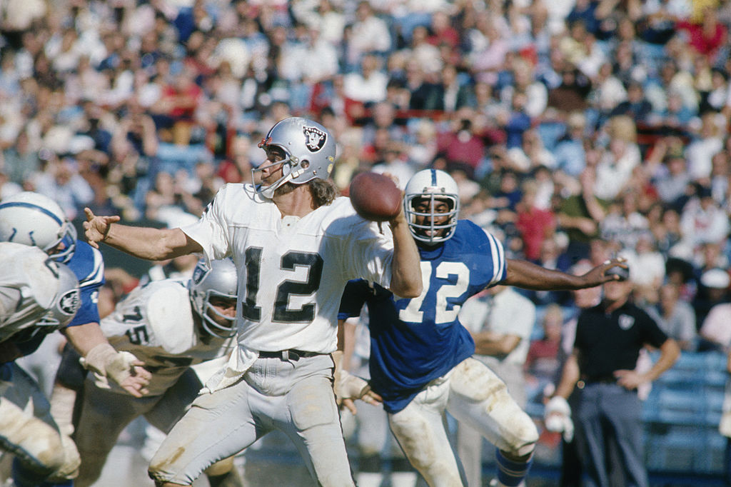 Ken Stabler cocking back to throw a pass during a Raiders game