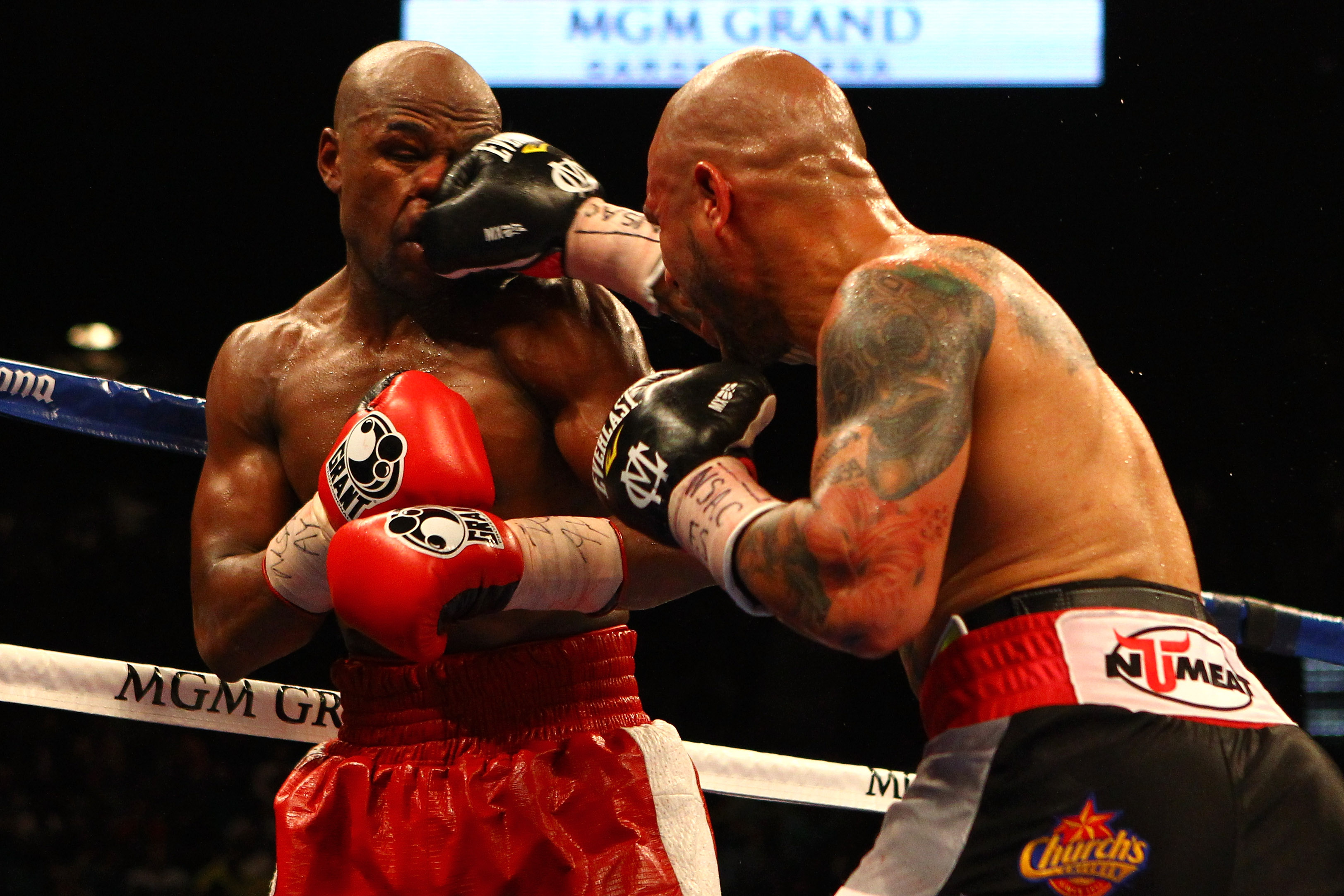 Miguel Cotto and Floyd Mayweather Jr.