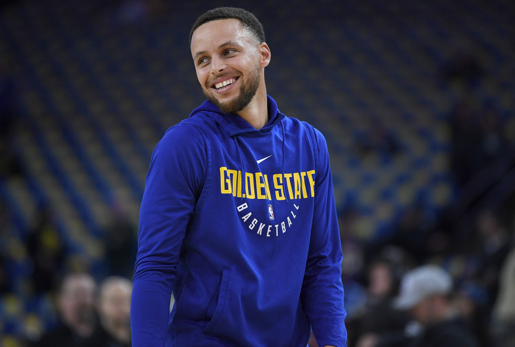 Stephen Curry of the Golden State Warriors laughs